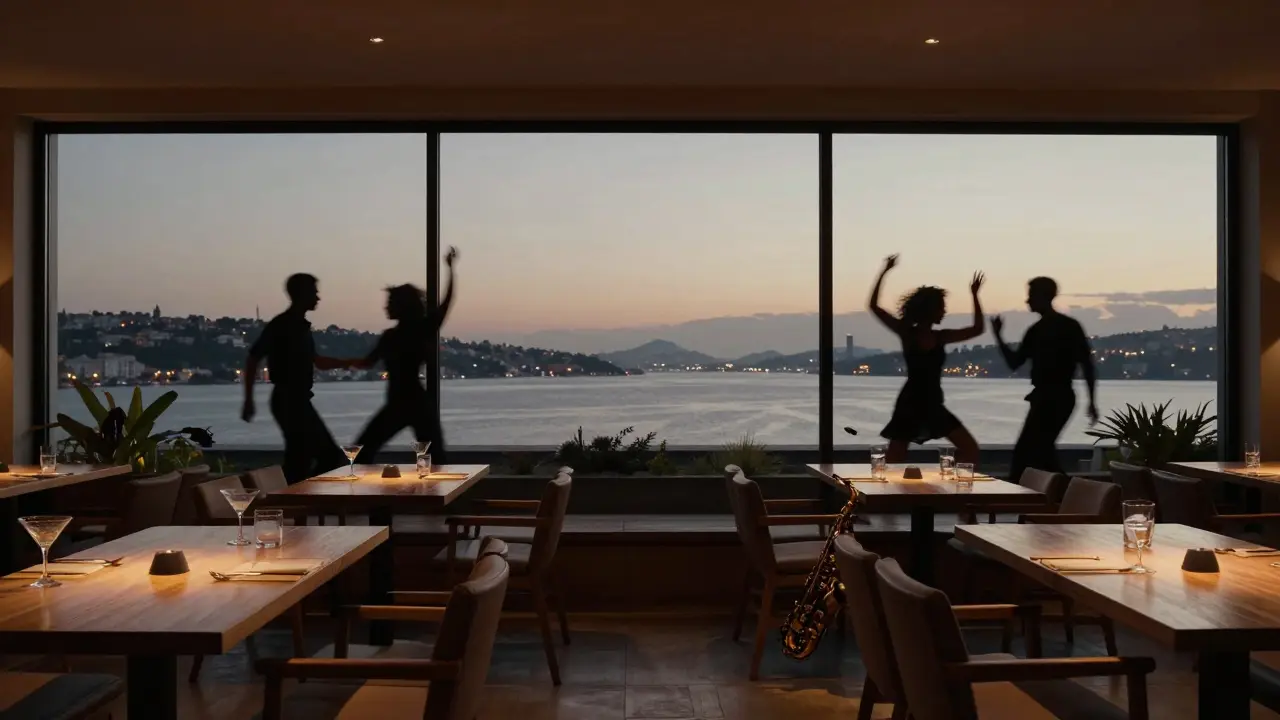 Silhouettes of dancers at Arma rooftop lounge overlooking the Golden Horn at night.